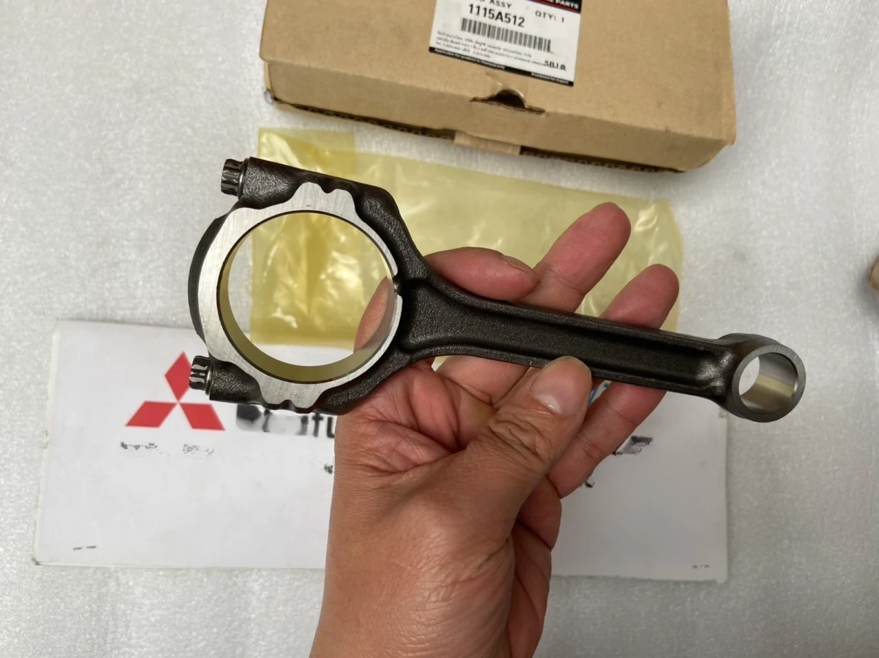 Tay biên xe mitsubishi Mirage Mã sp: 1115A512 | Tình trạng: Còn hàng